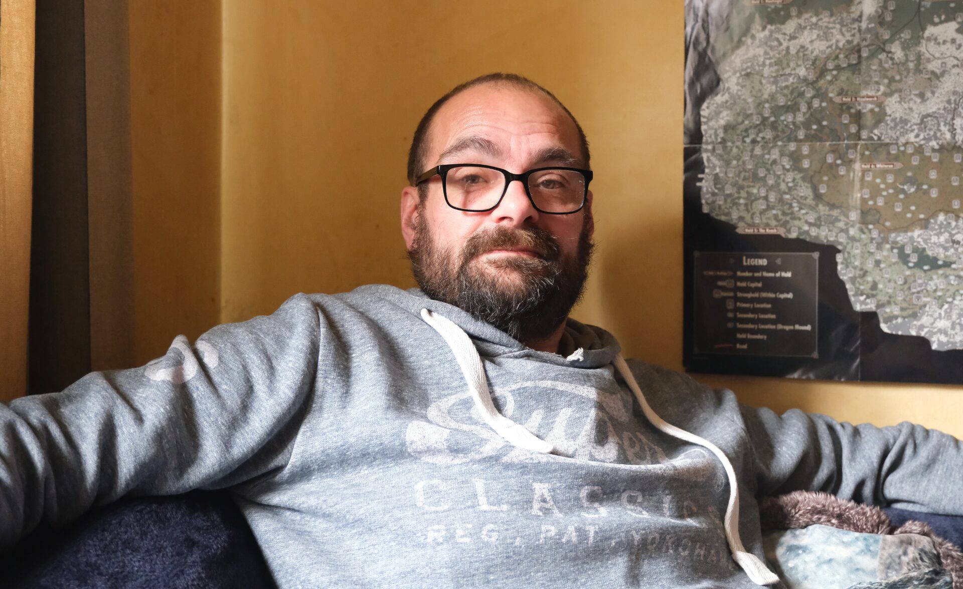 A Southdown tenant sitting in his home.
