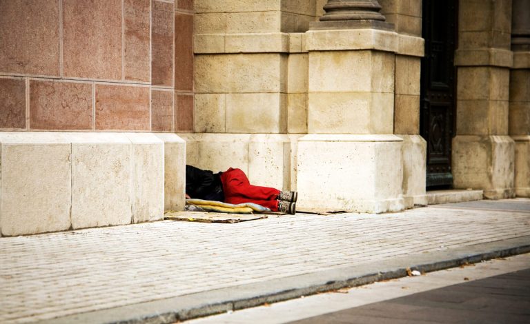 A person sleeping rough on the street